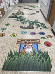 Colorful sensory path with animal and nature-themed elements for children.